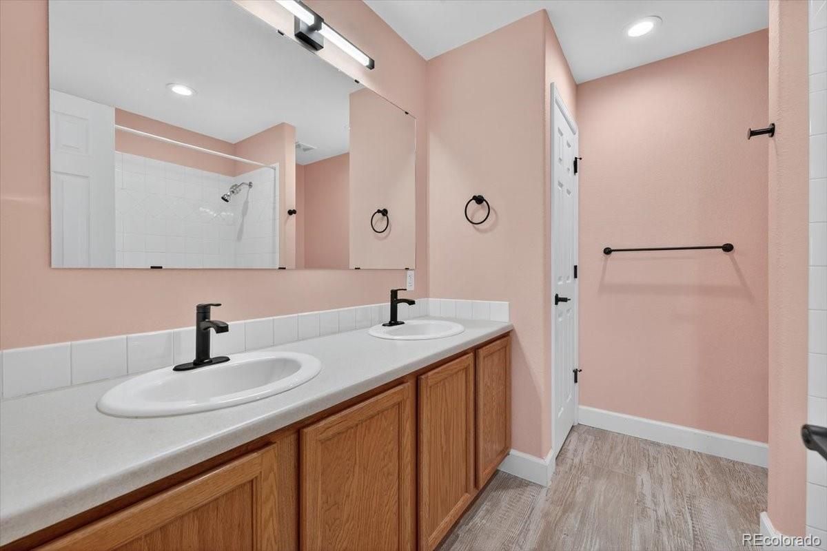 Bathroom, Dual Sink Vanities, Interior, Recessed Lighting, Wood Texture Flooring