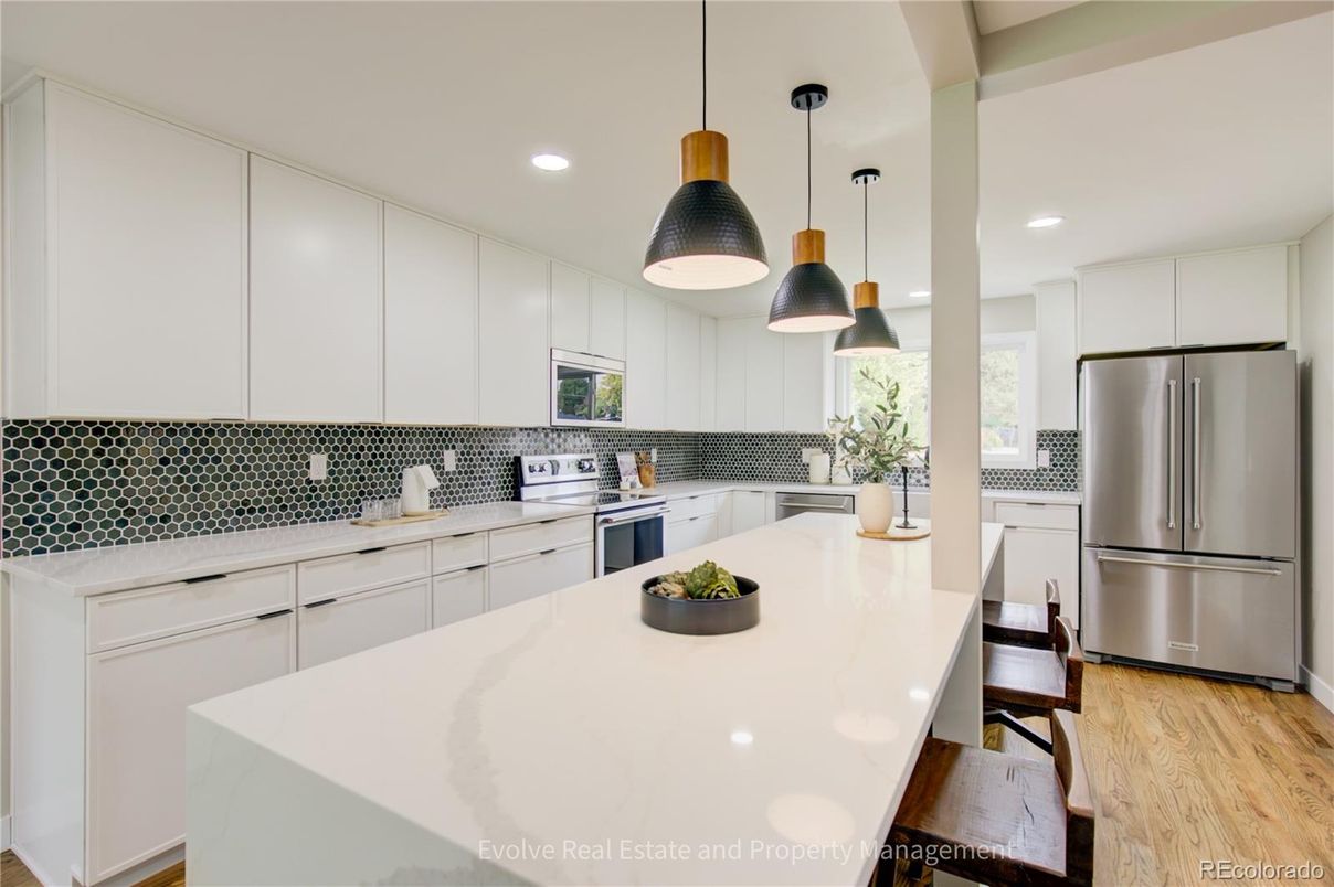 Interior, Kitchen, Pendant Lights, Recessed Lighting, Stainless Steel Appliances, Wood Texture Flooring