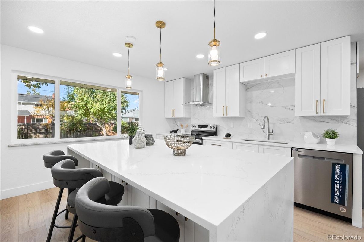 Interior, Kitchen, Marble Walls, Pendant Lights, Recessed Lighting, Stainless Steel Appliances, Wood Texture Flooring