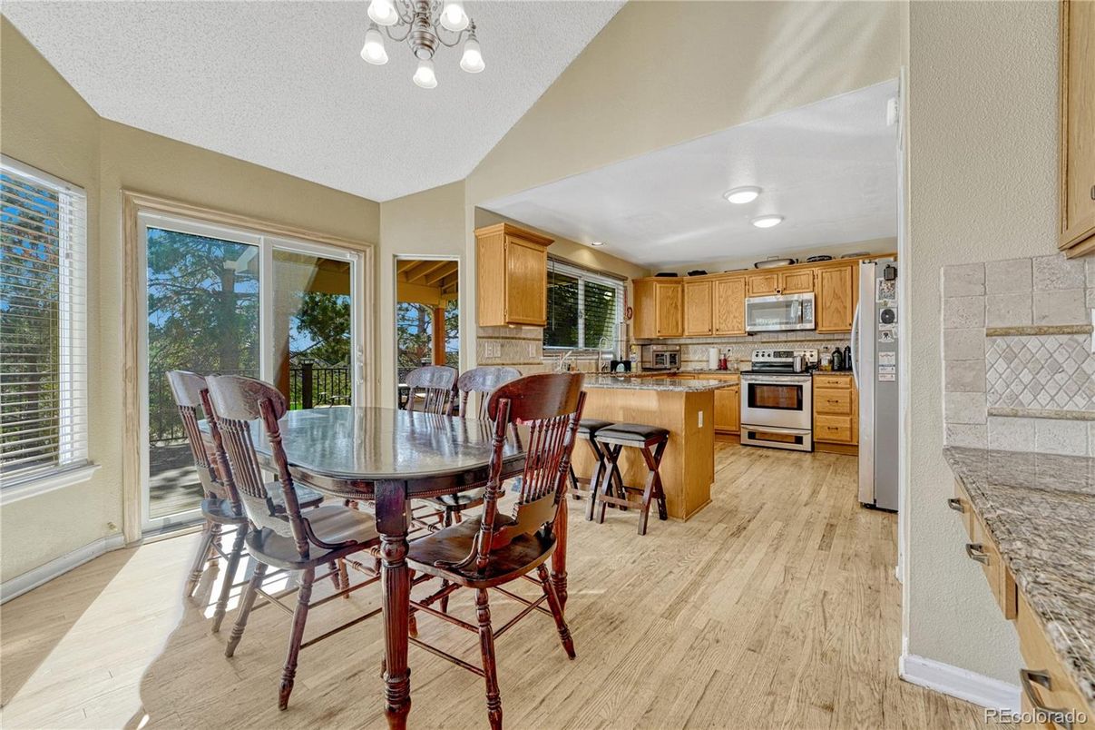 Dining room, Interior, Kitchen, Recessed Lighting, Stainless Steel Appliances, Wood Texture Flooring