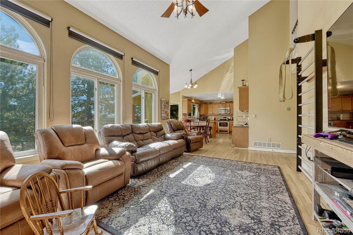 Chandelier, Dining room, Interior, Kitchen, Living room, Stainless Steel Appliances, Wood Texture Flooring