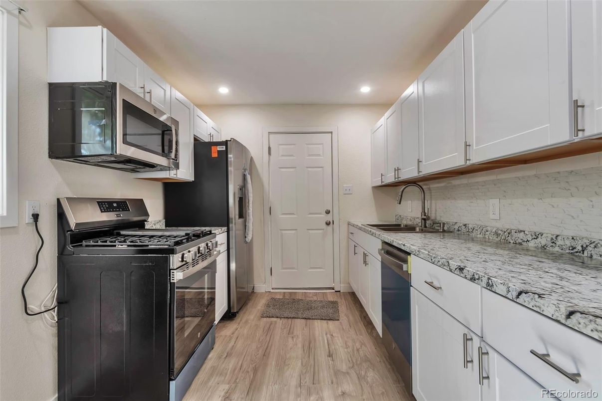 Interior, Kitchen, Recessed Lighting, Stainless Steel Appliances, Wood Texture Flooring