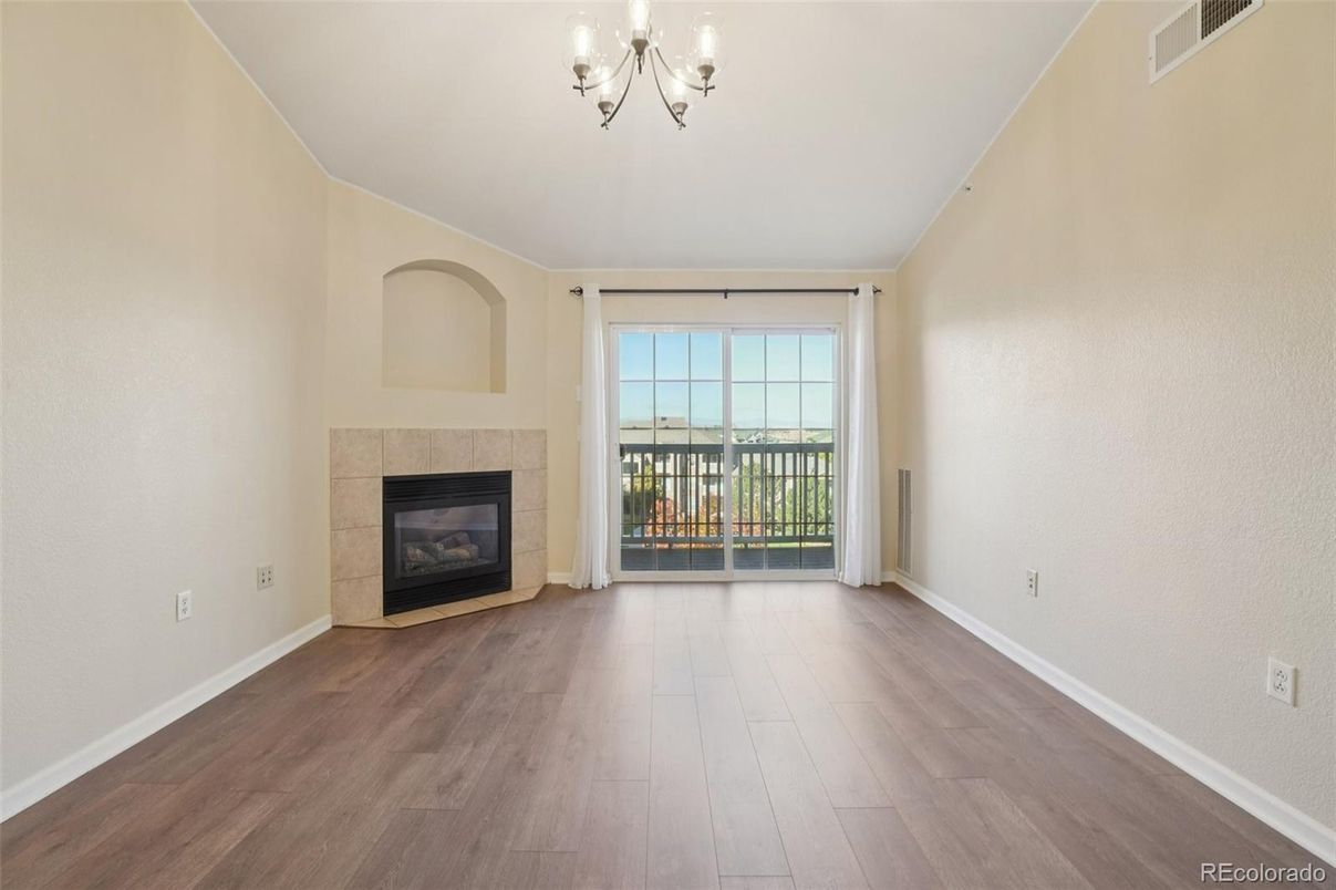 Chandelier, Empty room, Fireplace, Interior, Wood Texture Flooring