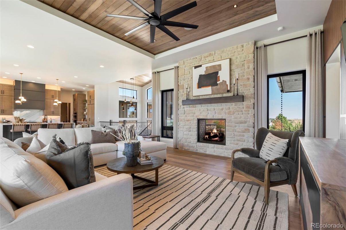 Fireplace, Interior, Kitchen, Living room, Pendant Lights, Recessed Lighting, Stainless Steel Appliances, Stone Walls, Wooden Ceilings, Wood Texture Flooring