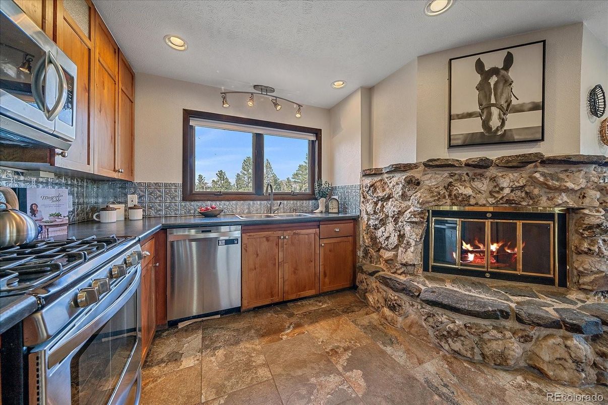 Fireplace, Interior, Kitchen, Recessed Lighting, Stainless Steel Appliances
