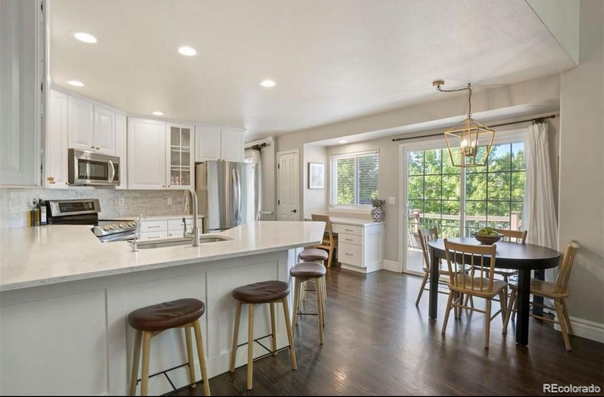 Dining room, Interior, Kitchen, Pendant Lights, Recessed Lighting, Stainless Steel Appliances, Wood Texture Flooring