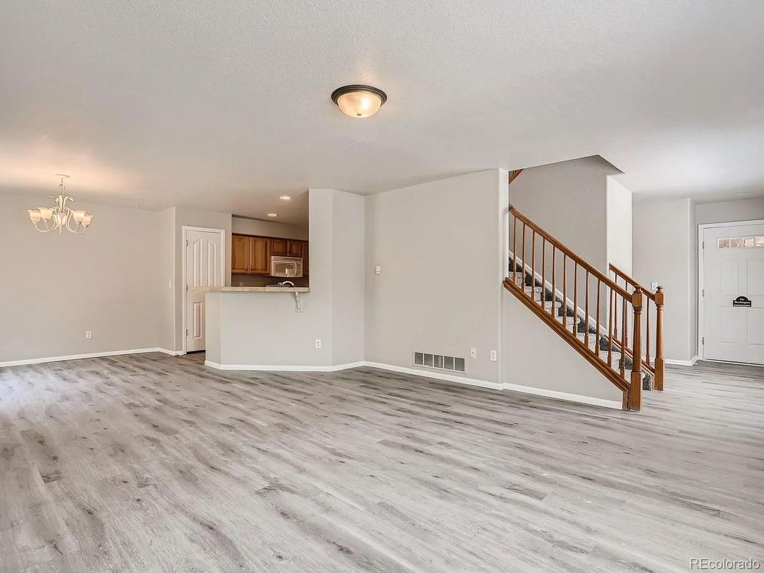Chandelier, Empty room, Interior, Kitchen, Recessed Lighting, Wood Texture Flooring