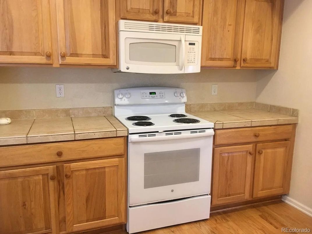 Interior, Kitchen, Tile Countertops, Wood Texture Flooring