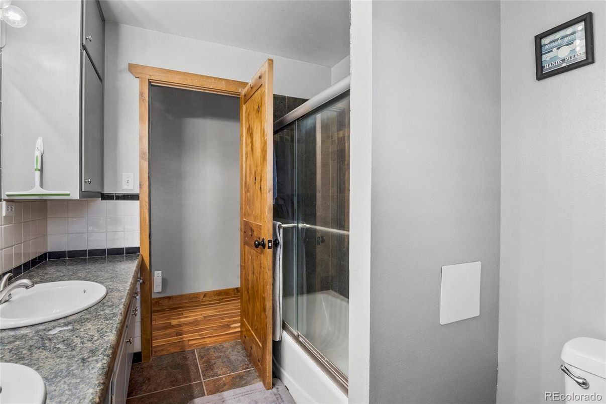 Bathroom, Dual Sink Vanities, Glass Shower, Interior, Wood Texture Flooring