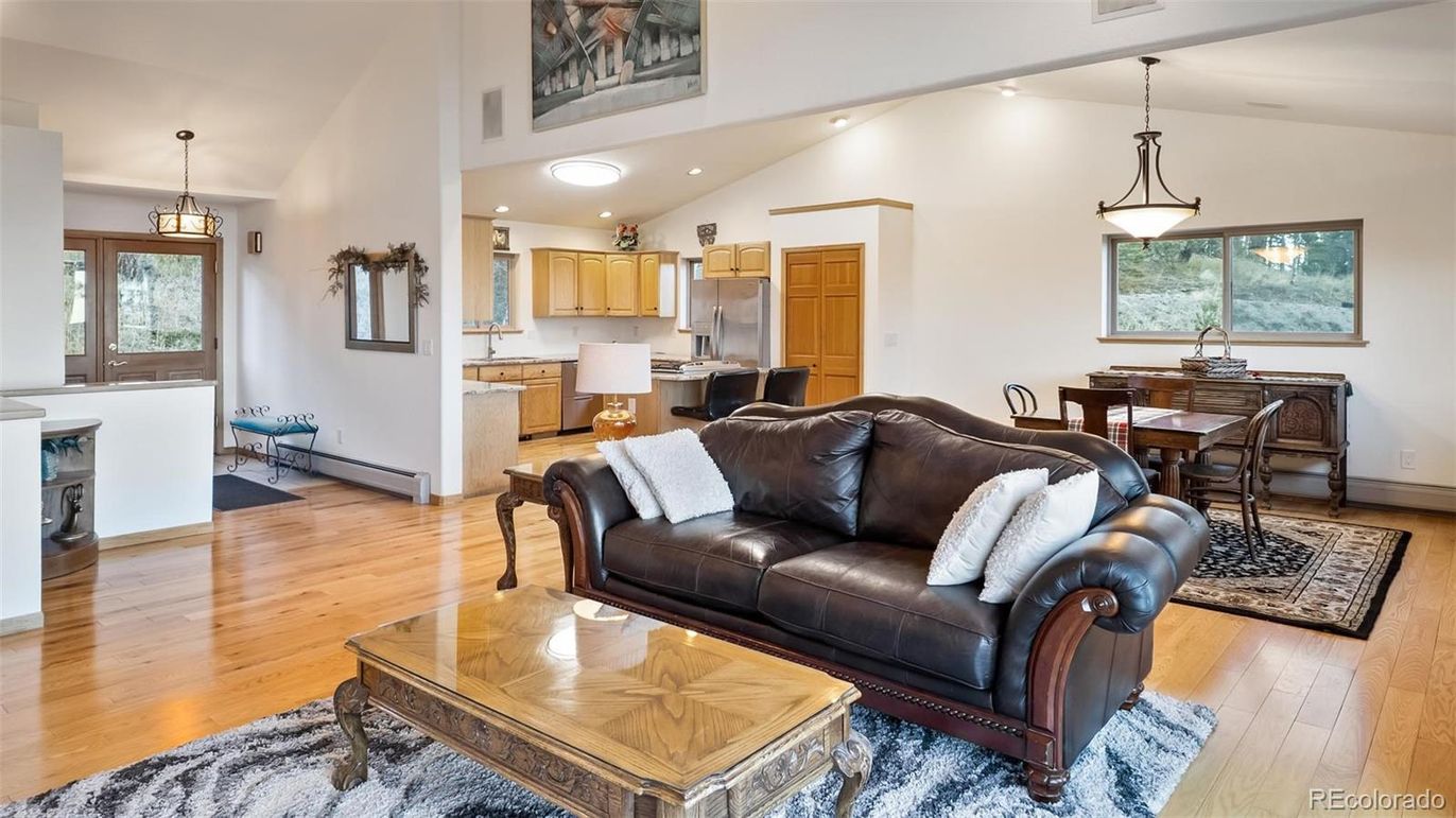 Dining room, Interior, Kitchen, Living room, Pendant Lights, Recessed Lighting, Stainless Steel Appliances, Wood Texture Flooring