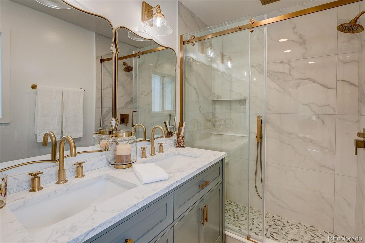 Bathroom, Dual Sink Vanities, Glass Shower, Interior, Marble Walls, Recessed Lighting