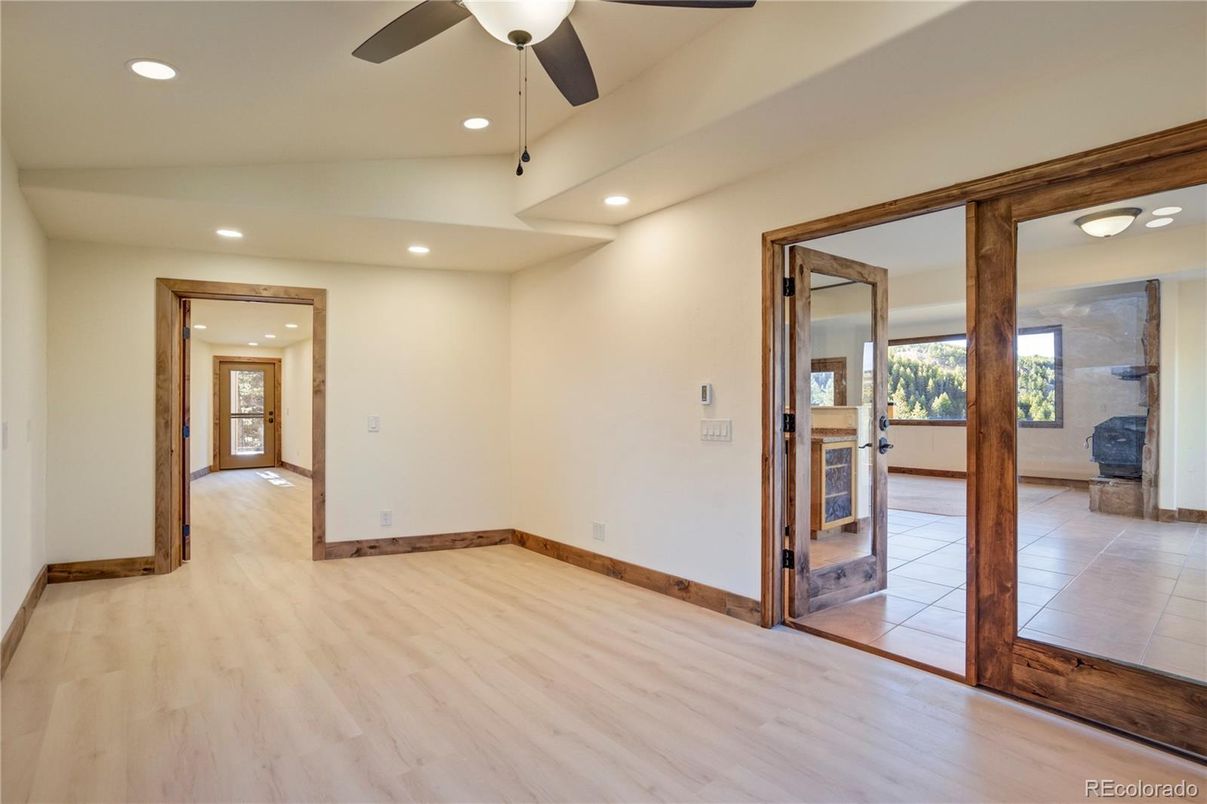 Empty room, Fireplace, Interior, Recessed Lighting, Wood Texture Flooring
