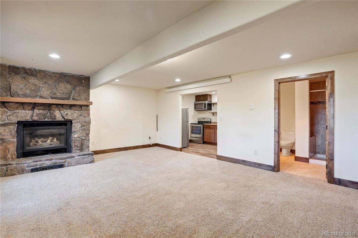 Empty room, Fireplace, Interior, Kitchen, Recessed Lighting, Stone Walls