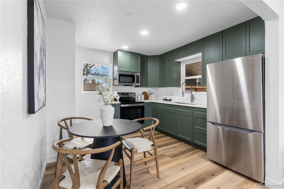 Dining room, Interior, Kitchen, Recessed Lighting, Stainless Steel Appliances, Wood Texture Flooring