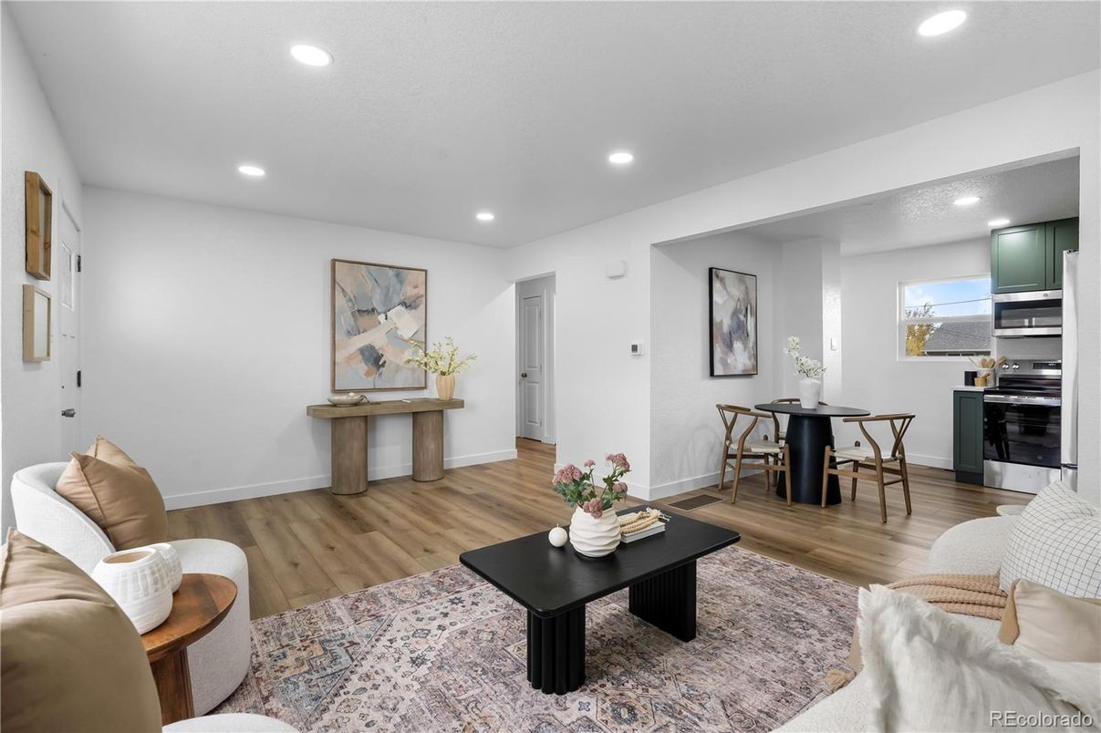 Dining room, Interior, Kitchen, Living room, Recessed Lighting, Stainless Steel Appliances, Wood Texture Flooring