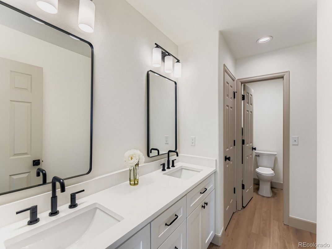 Bathroom, Dual Sink Vanities, Interior, Recessed Lighting, Wood Texture Flooring