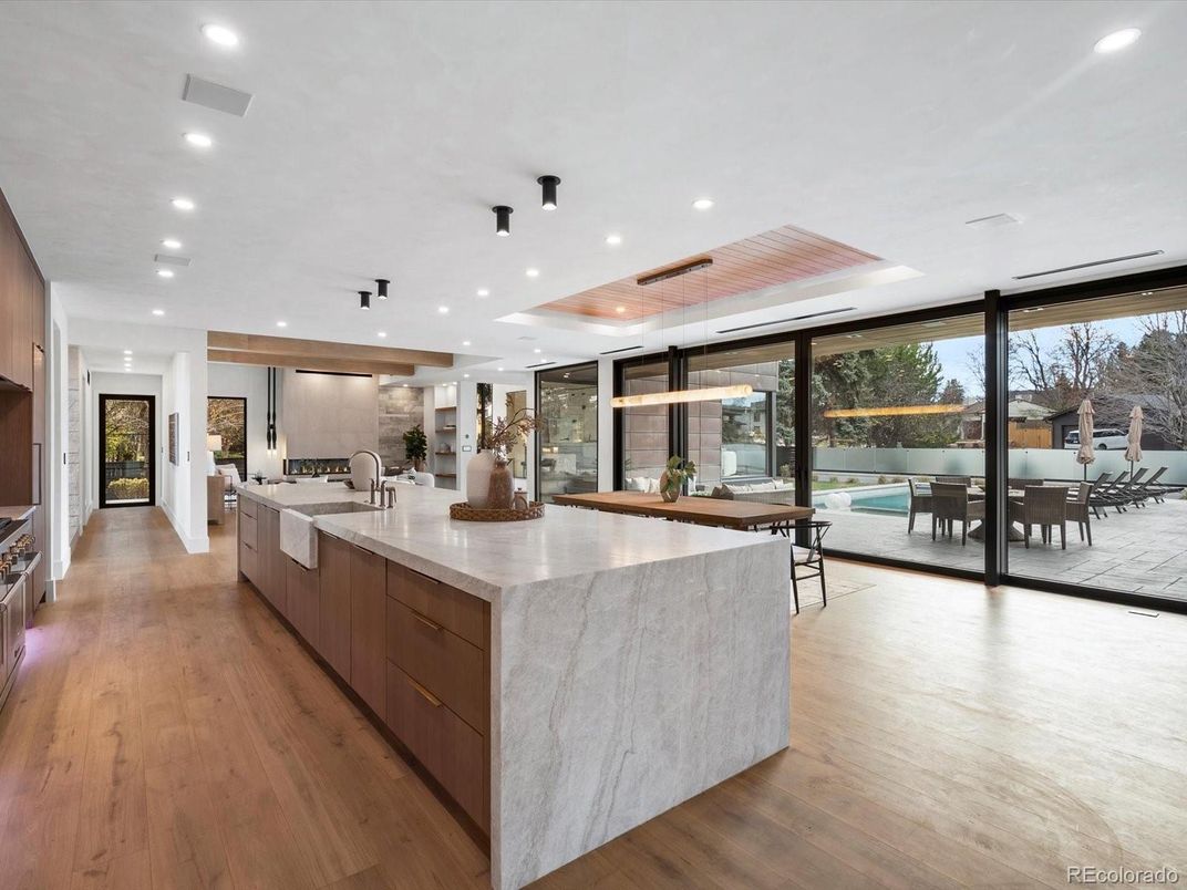 Dining room, Interior, Kitchen, Pendant Lights, Recessed Lighting, Stainless Steel Appliances, Wood Texture Flooring