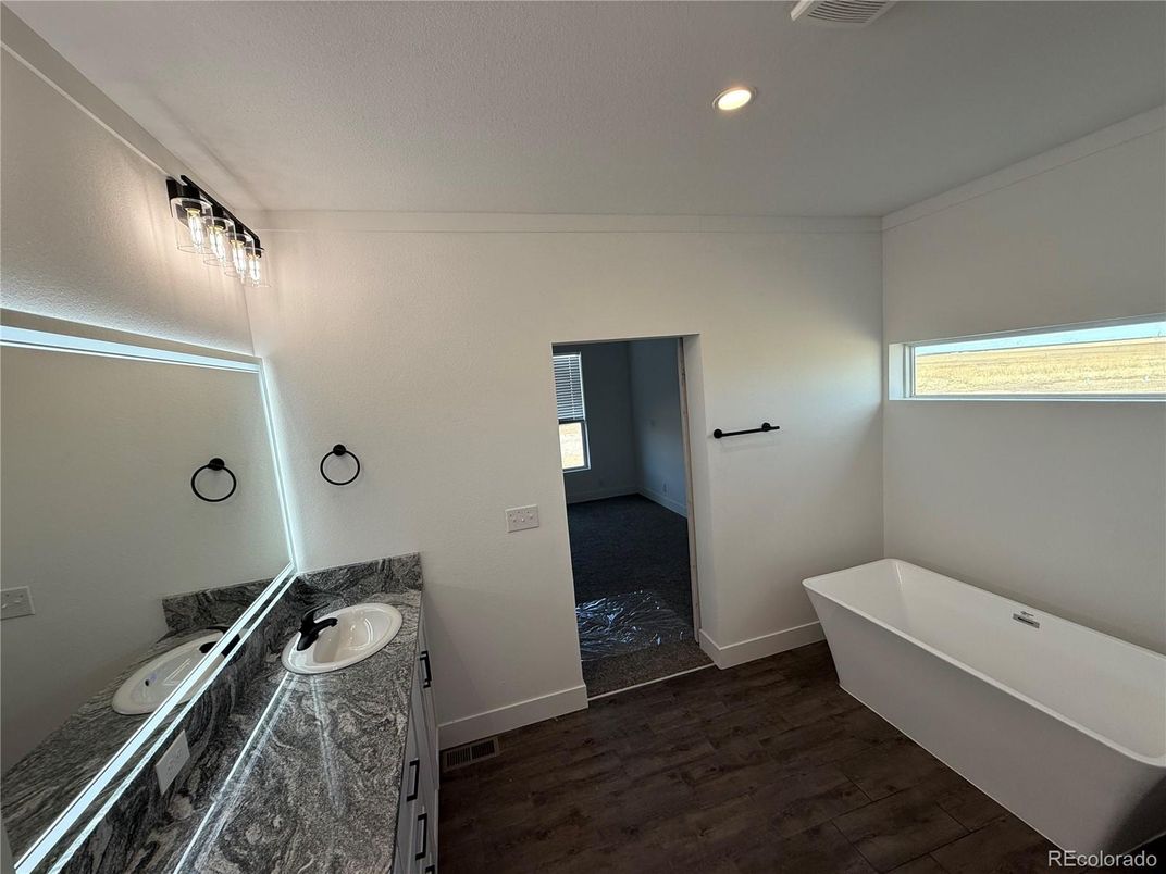 Bathroom, Free Standing Baths, Interior, Recessed Lighting, Wood Texture Flooring