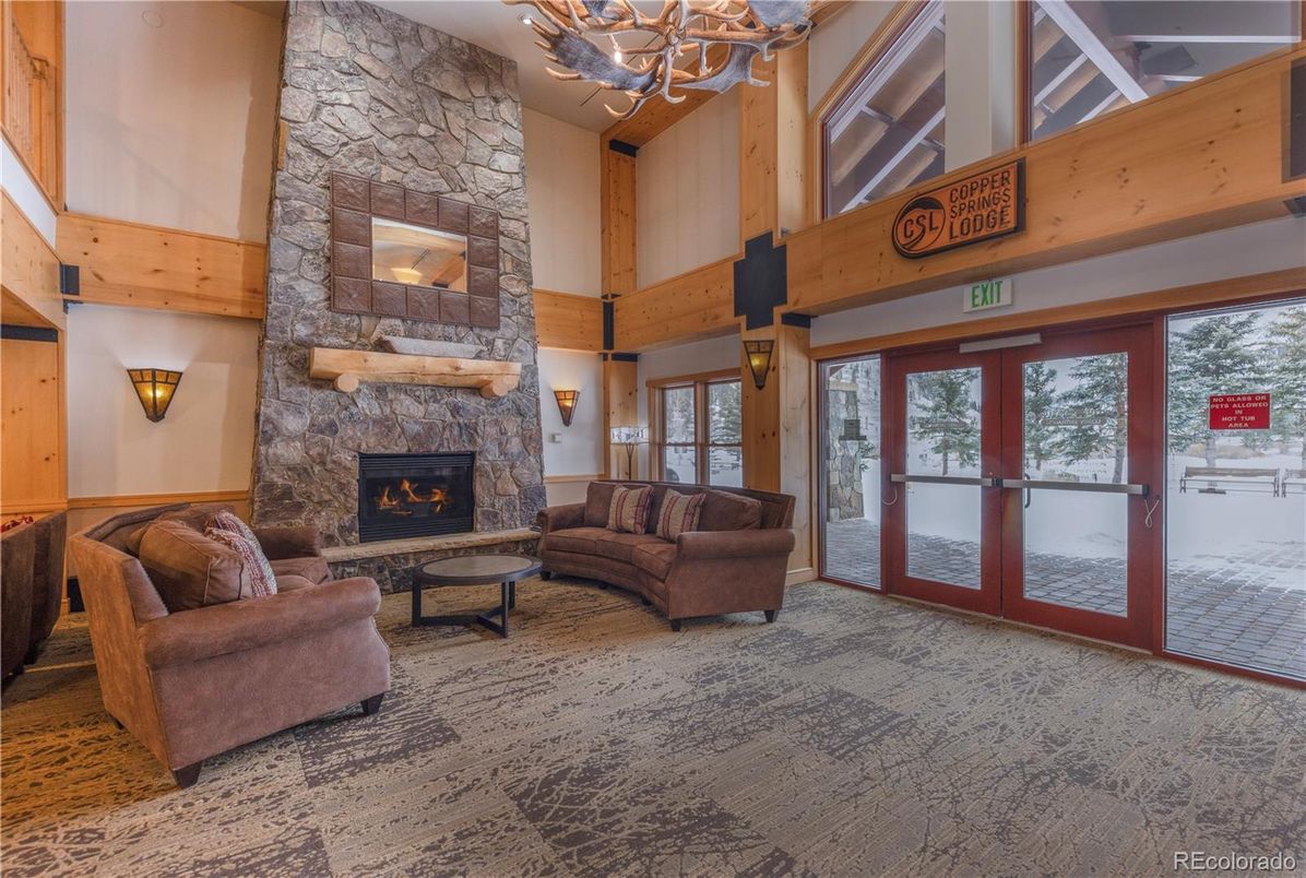 Chandelier, Fireplace, Interior, Living room, Stone Walls, Wooden Walls