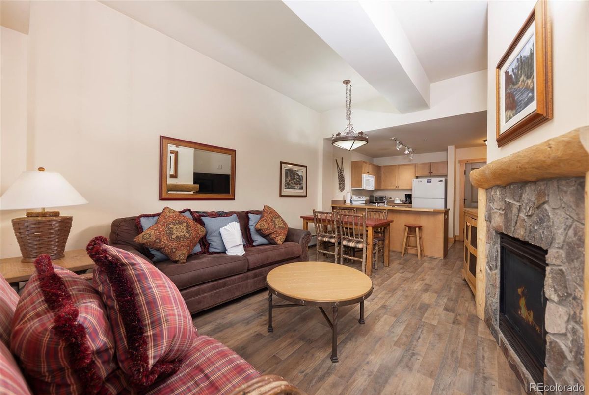 Dining room, Fireplace, Interior, Kitchen, Living room, Pendant Lights, Wood Texture Flooring