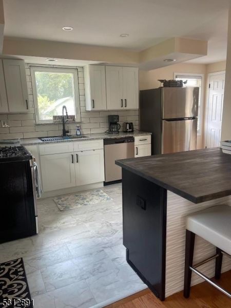 Interior, Kitchen, Marble, Recessed Lighting, Stainless Steel Appliances, Wood Texture Flooring