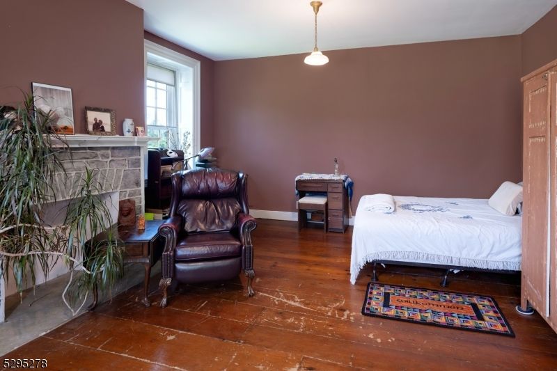 Bedroom, Fireplace, Interior, Pendant Lights, Wood Texture Flooring