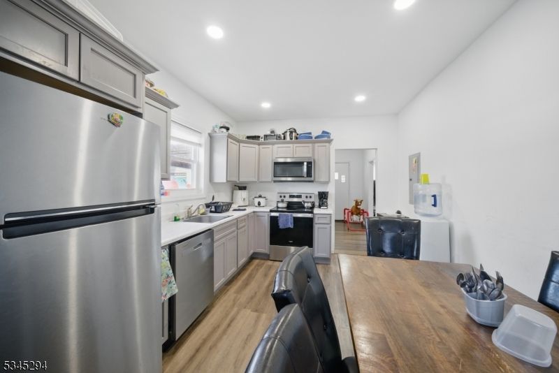 Interior, Kitchen, Recessed Lighting, Stainless Steel Appliances, Wood Texture Flooring