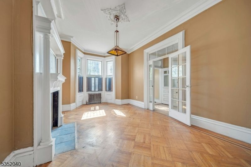 Empty room, Fireplace, Interior, Pendant Lights, Wood Texture Flooring