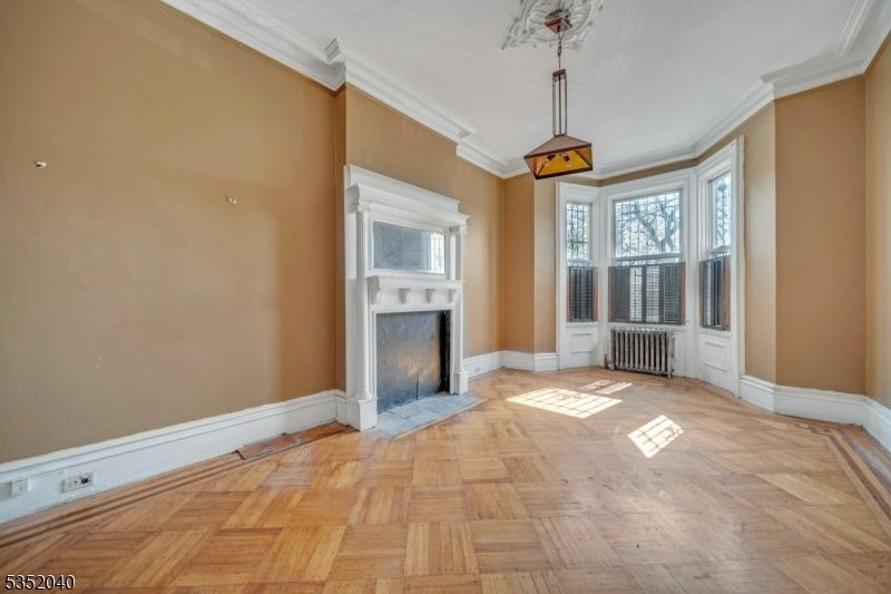 Empty room, Fireplace, Interior, Pendant Lights, Wood Texture Flooring