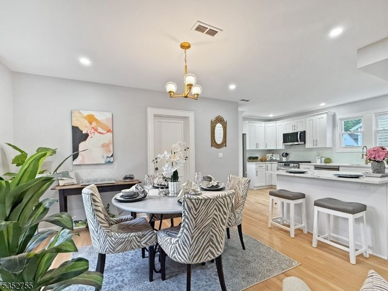 Chandelier, Dining room, Interior, Kitchen, Pendant Lights, Recessed Lighting, Wood Texture Flooring
