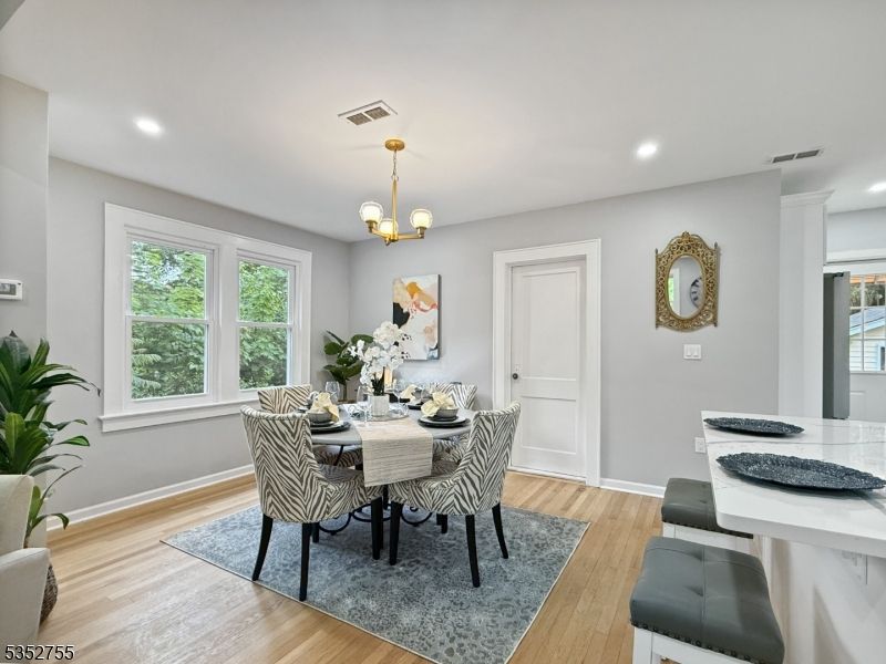 Chandelier, Dining room, Interior, Recessed Lighting, Wood Texture Flooring