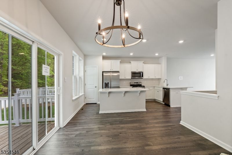 Chandelier, Interior, Kitchen, Recessed Lighting, Stainless Steel Appliances, Wood Texture Flooring