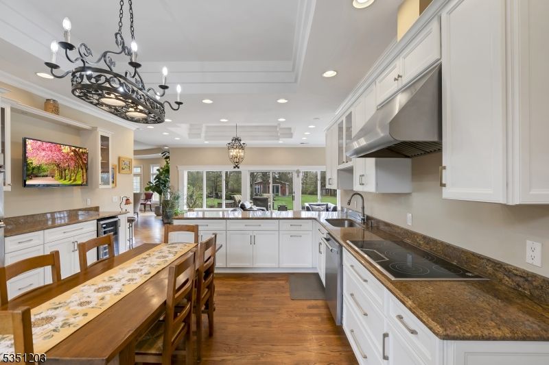 Chandelier, Interior, Kitchen, Recessed Lighting, Stainless Steel Appliances, Wood Texture Flooring