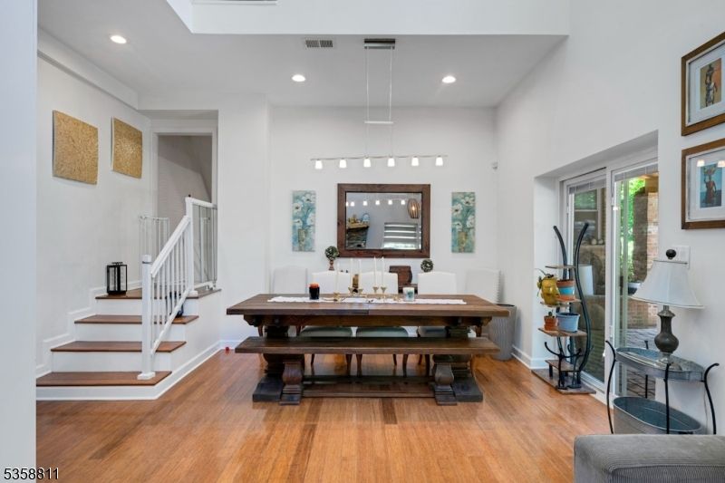 Dining room, Game Room, Interior, Pendant Lights, Recessed Lighting, Wood Texture Flooring