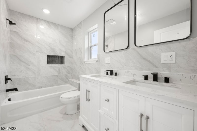 Bathroom, Dual Sink Vanities, Interior, Marble, Marble Walls, Recessed Lighting