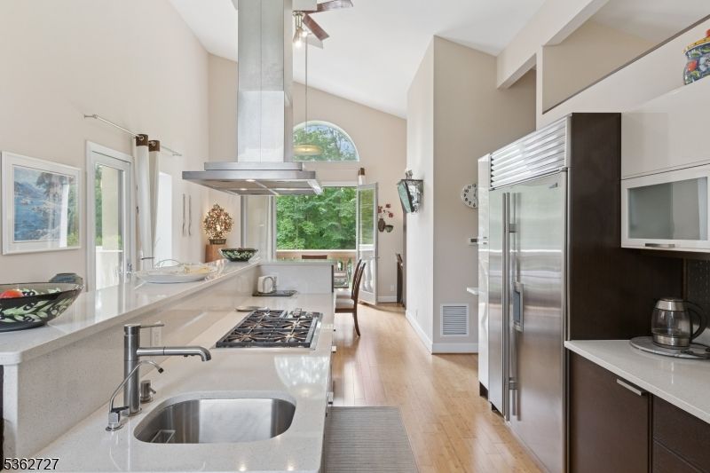 Dining room, Interior, Kitchen, Pendant Lights, Stainless Steel Appliances, Wood Texture Flooring
