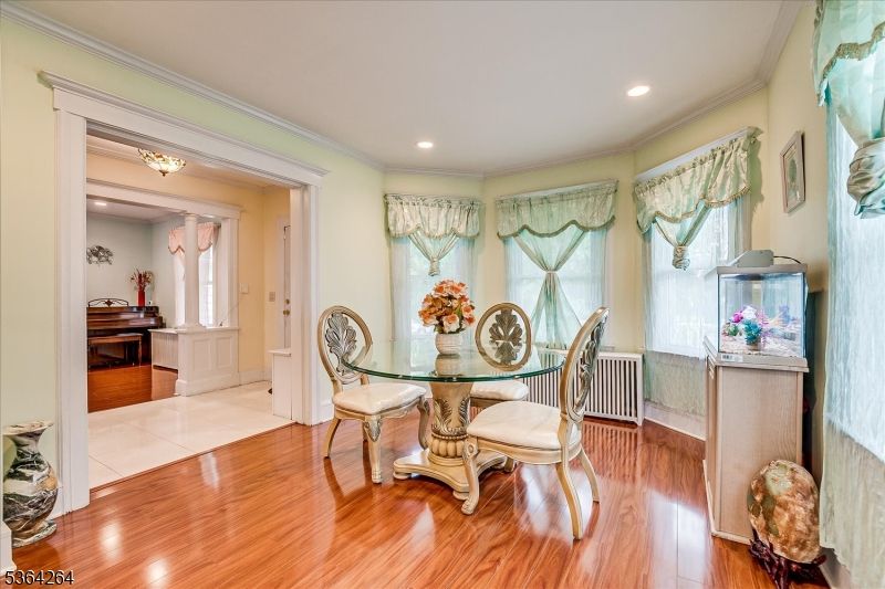 Dining room, Interior, Piano, Recessed Lighting, Wood Texture Flooring