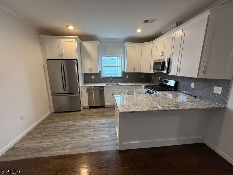 Interior, Kitchen, Recessed Lighting, Stainless Steel Appliances, Wood Texture Flooring