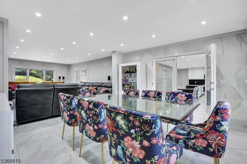 Dining room, Interior, Kitchen, Living room, Marble, Marble Walls, Recessed Lighting, Stainless Steel Appliances