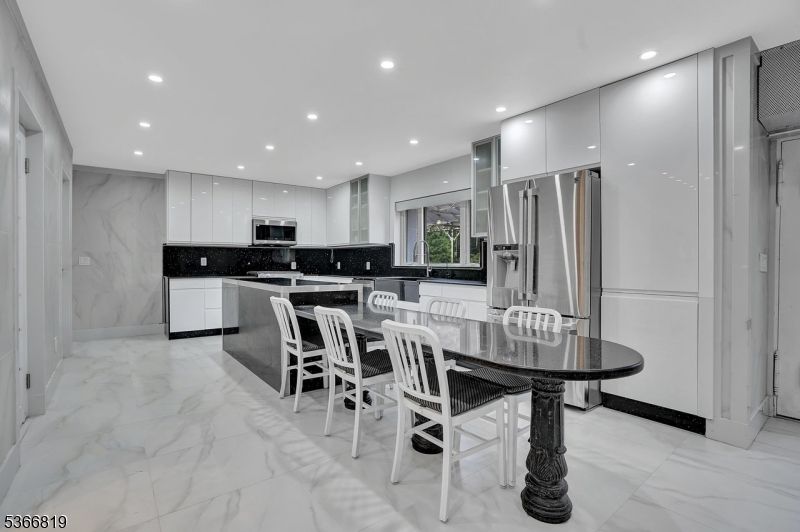 Interior, Kitchen, Marble, Marble Walls, Recessed Lighting, Stainless Steel Appliances