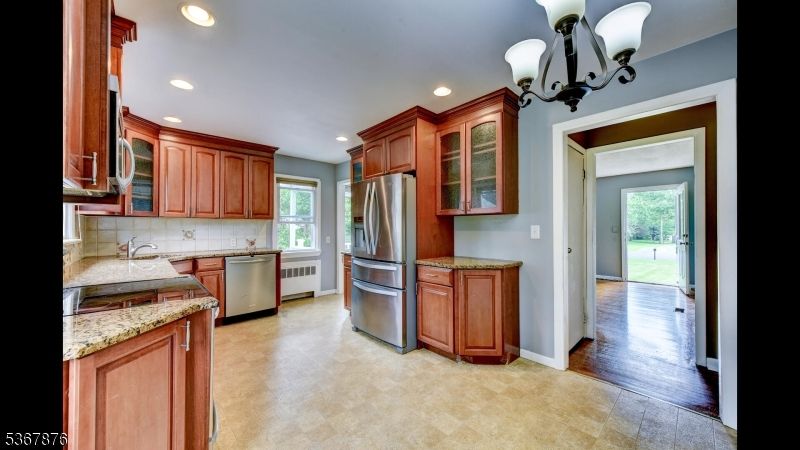 Chandelier, Interior, Kitchen, Recessed Lighting, Stainless Steel Appliances, Wood Texture Flooring