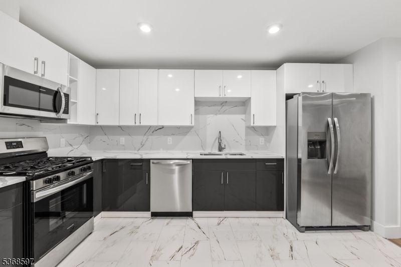 Interior, Kitchen, Marble, Marble Walls, Recessed Lighting, Stainless Steel Appliances
