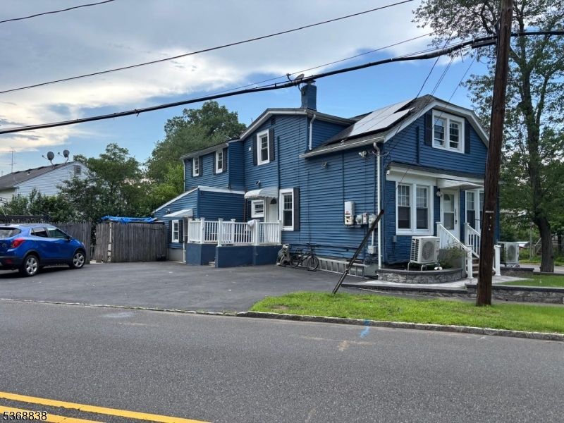 Exterior, Facade, Solar Panels, Queen Anne Victorian