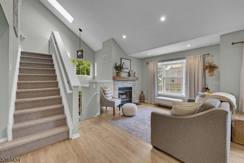 Fireplace, Interior, Pendant Lights, Recessed Lighting, Wood Texture Flooring