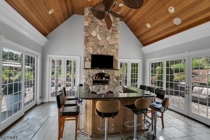 Fireplace, Interior, Recessed Lighting, Stone Walls, Wooden Ceilings