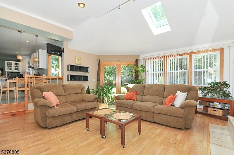 Dining room, Fireplace, Interior, Kitchen, Living room, Pendant Lights, Recessed Lighting, Wood Texture Flooring