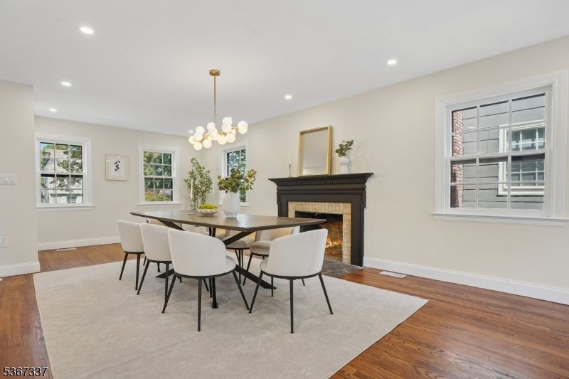 Dining room, Fireplace, Interior, Pendant Lights, Recessed Lighting, Wood Texture Flooring
