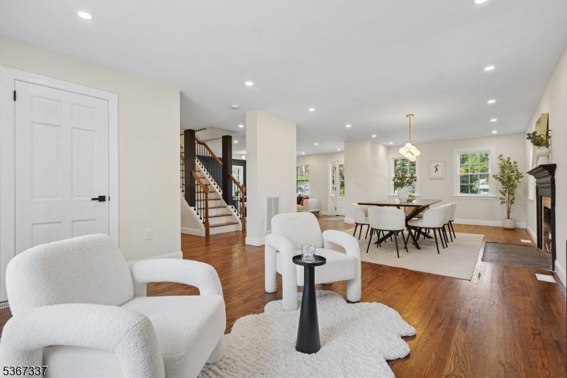 Dining room, Fireplace, Interior, Pendant Lights, Recessed Lighting, Wood Texture Flooring