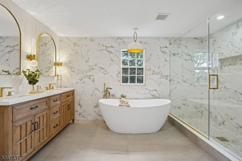 Bathroom, Dual Sink Vanities, Free Standing Baths, Glass Shower, Interior, Marble Walls, Recessed Lighting