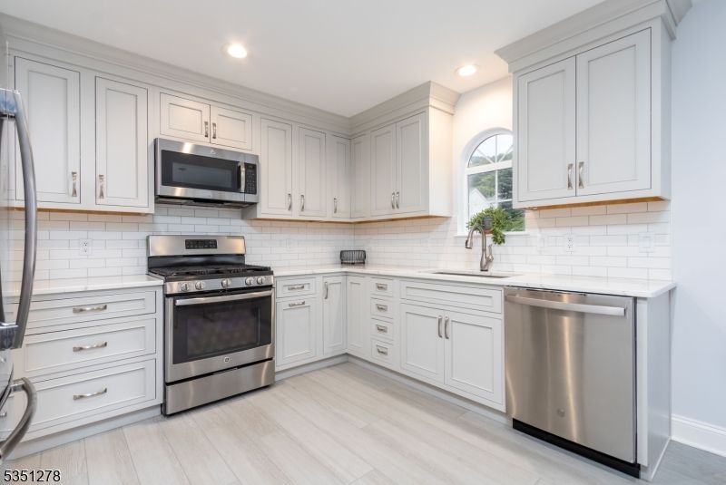 Interior, Kitchen, Recessed Lighting, Stainless Steel Appliances, Wood Texture Flooring